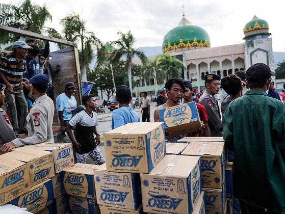 Die Glückskette führt am heutigen Freitag einen nationalen Sammeltag für die Opfer des Erdbebens und Tsunamis in Indonesien durch. (Bild: KEYSTONE/EPA/MAST IRHAM)