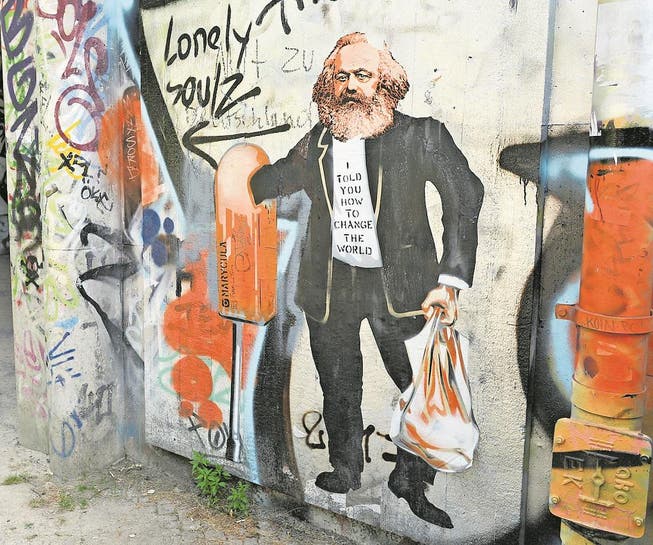 Marx lebt – nicht nur in etwas schummrigen Unterführungen wie hier in Berlin. (Bild: Artur Widak/Getty)
