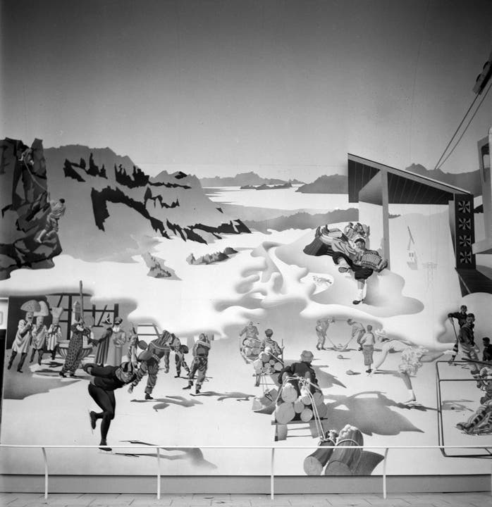 1939: Ausschnitt aus Hans Ernis Wandbild «Die Schweiz, das Ferienland der Völker» an der Schweizerischen Landesausstellung am 10. Oktober 1939 in Zürich. (Bild: Keystone/Photopress-Archiv)