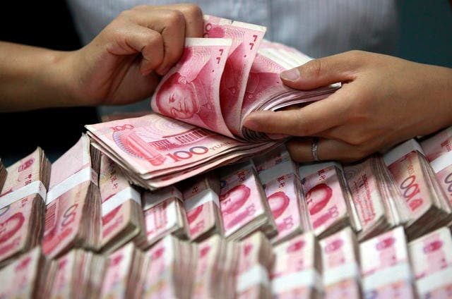 Die Behörden haben die illegalen Machenschaften der bisher grösste Untergrundbank Chinas aufgedeckt. (Bild: Chinatopix via AP)