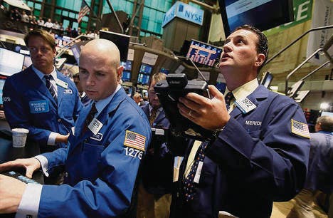 Auf dem New Yorker Börsenparkett ist die Stimmung schon fast wieder so geschäftig wie in den Boomjahren. (Bild: ap/Richard Drew)