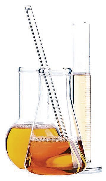 Laboratory glassware with yellow liquids on white background (Bild: DenisNata (39774759))