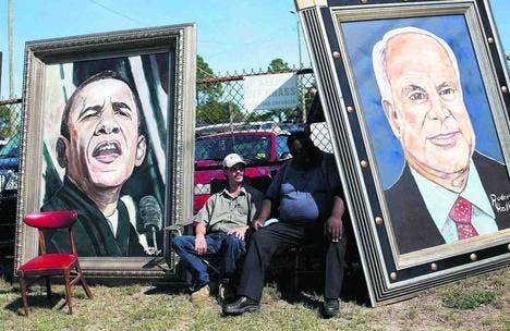 Grossflächiges für Fans: Strassenhändler in Wilmington, North Carolina, bieten Bilder von Barack Obama und John McCain an. (Bild: rtr/Carlos Barria)