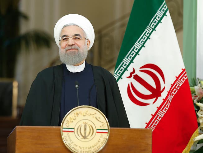 Der iranische Präsident Hassan Ruhani lehnt eine Neuverhandlung des Atomabkommen kategorisch ab. (Bild: KEYSTONE/PETER KLAUNZER)