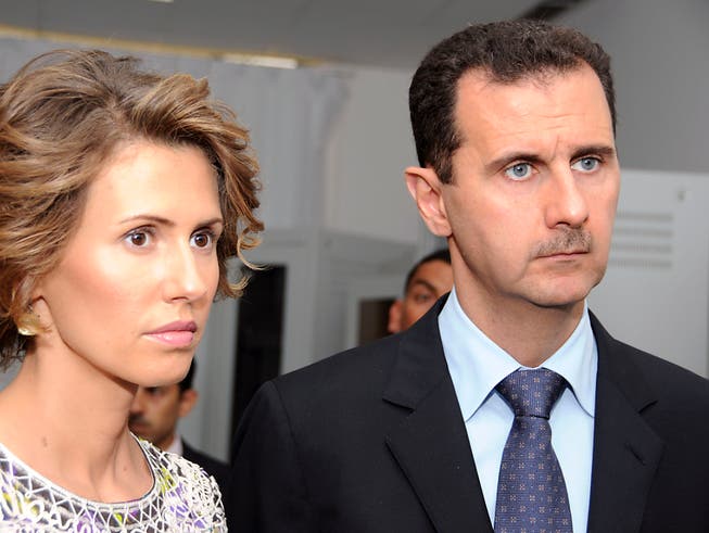 Asma und Baschar al-Assad in einer Aufnahme von Juli 2010 in Tunis. (Bild: KEYSTONE/AP/Hassene Dridi)