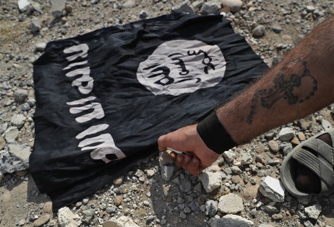 Die Flagge des IS. (Symbolbild: Hussein Malla/Keystone)