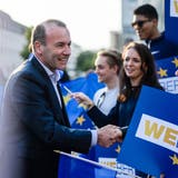 epa07590643 The CDU/CSU top candidate for the upcoming European Parliament Elections, European People's Party (EPP) chairman Manfred Weber, shakes hands with supporters as he arrives for a television debate in Berlin, Germany, 21 May 2019. The European Parliament election will be held in Germany on 26 May 2019.  EPA/CLEMENS BILAN
