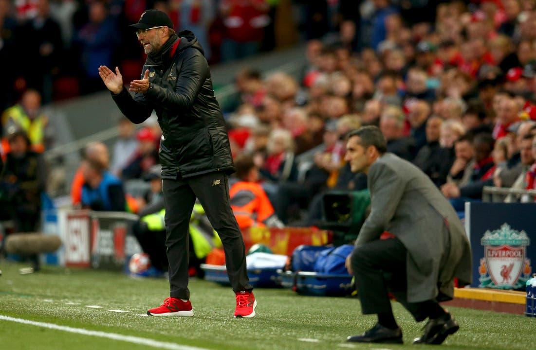 Liverpool-Trainer Jürgen Klopp (links) und Barcelona-Trainer Ernesto Valverde. (Bild: Dave Thompson / AP)