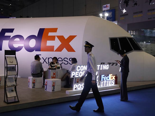Der amerikanische Logistikanbieter Fedex kommt in China immer mehr unter Druck. (Bild: KEYSTONE/AP/NG HAN GUAN)