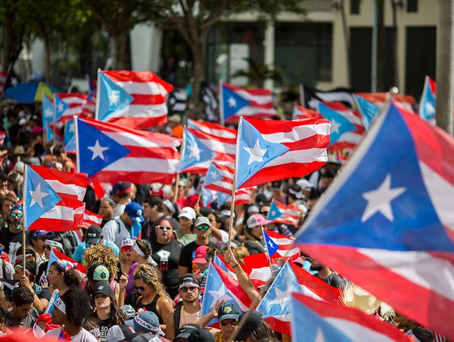 Nach der Rücktrittsankündigung von Ricardo Rosselló aufgrund von Massenprotesten rätselt Puerto Rico derzeit über den Nachfolger auf dem Gouverneurposten. (Bild: KEYSTONE/AP/DENNIS M. RIVERA PICHARDO)