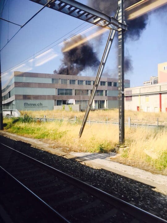 Der Brand vom Zug aus gesehen