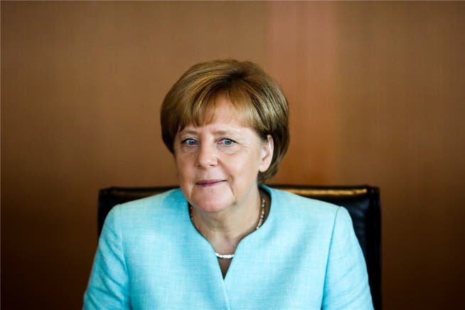 Angela Merkel interessiert sich für die Schweizer Praxis bei der Bearbeitung von Asylanträgen. Keystone