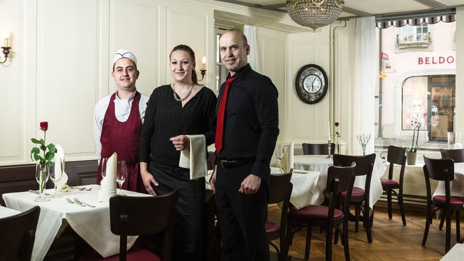 Gastgeber Fiore Kriezi, Mitarbeiterin Sandra Huser und Küchenchef Michele.