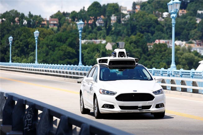 Uber will den Fahrer überflüssig machen. Bereits diesen Monat werden Passagiere in Pittsburg mit selbstfahrenden Autos herumchauffiert. Jared Wickerham/Keystone