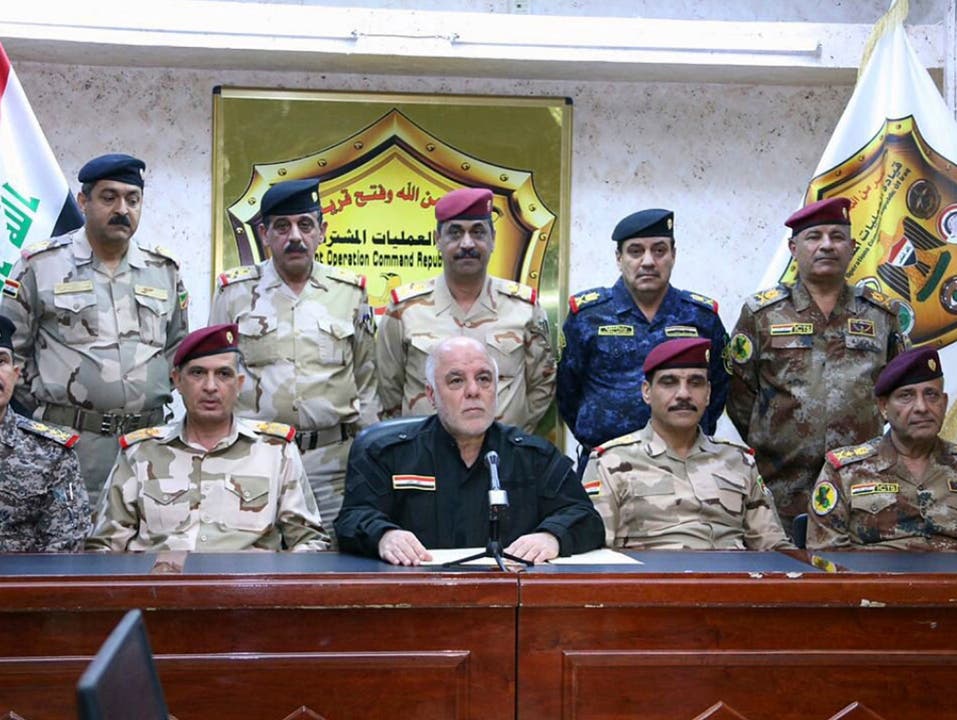 Verkündet den Sturm auf Mossul am Montag, 18. Oktober 2016: Iraks Premierminister Haider al-Abadi, umgeben von hochrangigen Offizieren.