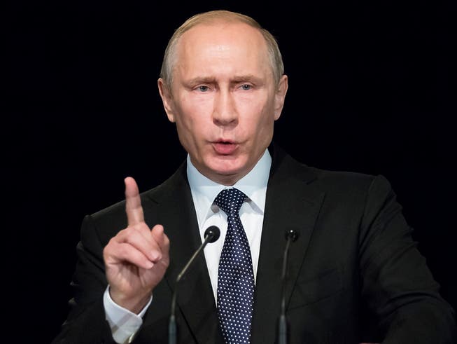 Der russische Präsident Wladimir Putin hat die deutsche Kanzlerin Angela Merkel aufgefordert, im Ukrainekonflikt Druck auf die ukrainische Regierung zu machen. (Archiv)