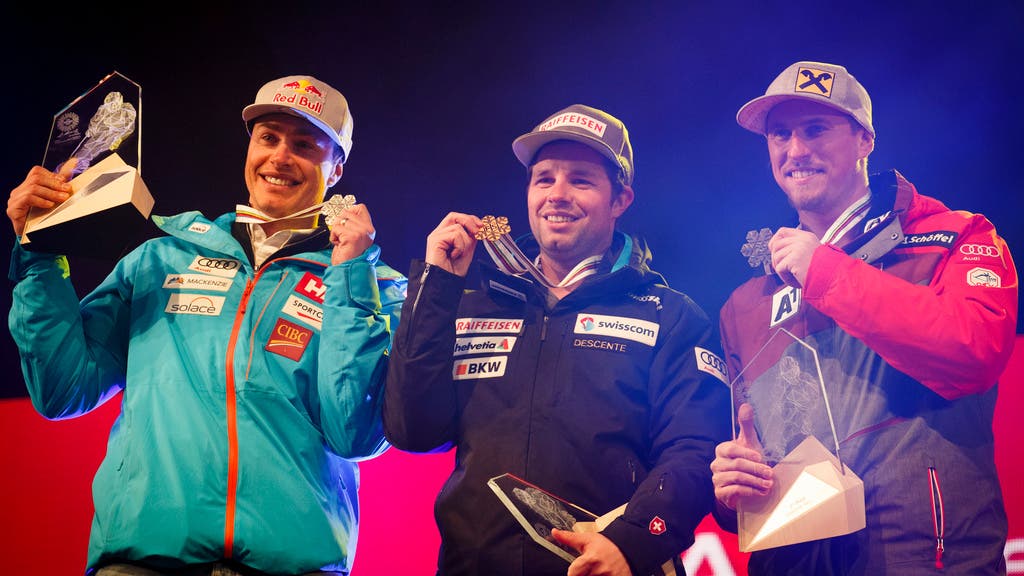 Feuz mit Silbermedaillengewinner Erik Guay (l.) und Max Franz, der Dritter wurde.