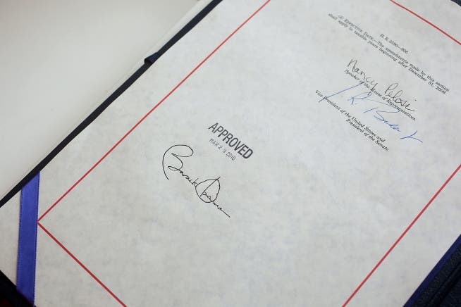 März 2010: Obama unterzeichnet die Krankenversicherung Obamacare