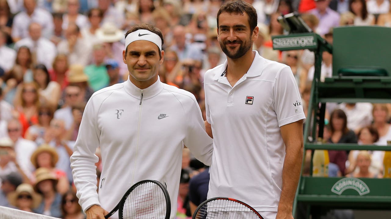 Vor dem Match: Das offizielle Foto der Finalgegner - der Schweizer Roger Federer und der Kroate Martin Cilic.