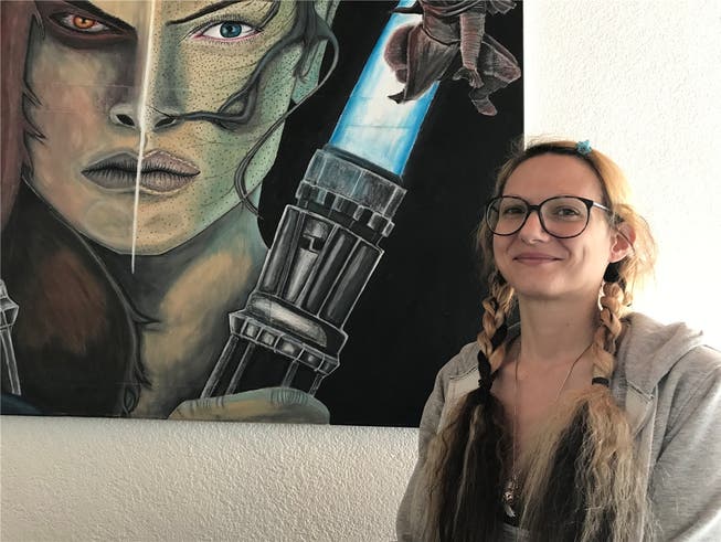 Die Künstlerin Sabrina Castioni vor ihrem Lieblingsbild, das Anakin Skywalker zeigt. LyL