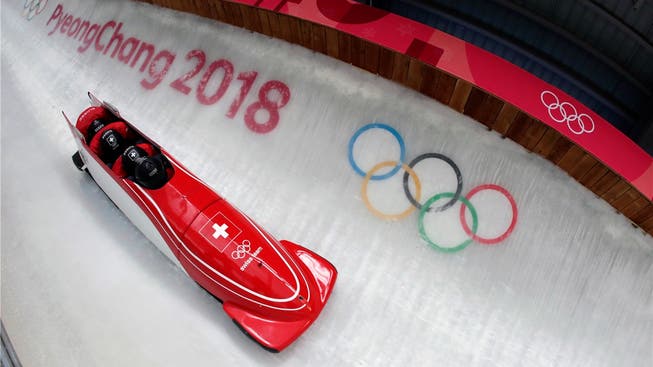 Der Schweizer Viererbob verpasst Olympia-Bronze um 0,21 Sekunden.