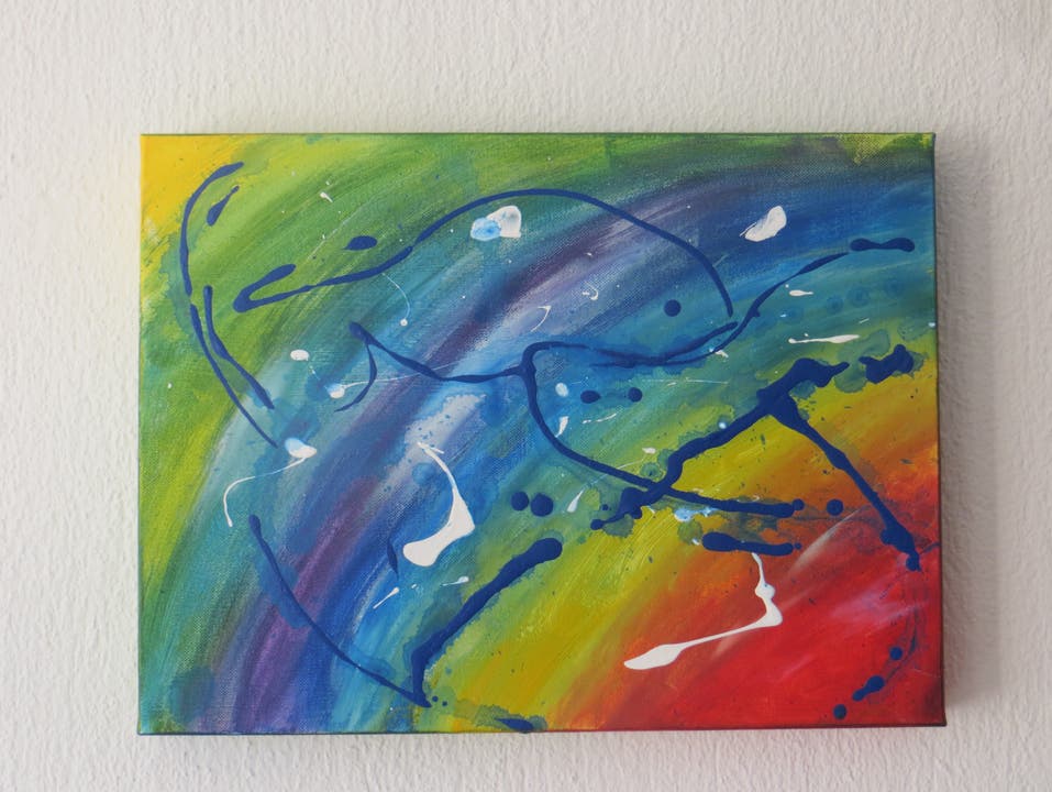 Zwei Delphine auf einem Regenbogenhintergrund - beide Motive sind dem Künstler erst auf Hinweis eines Bekannten aufgefallen.