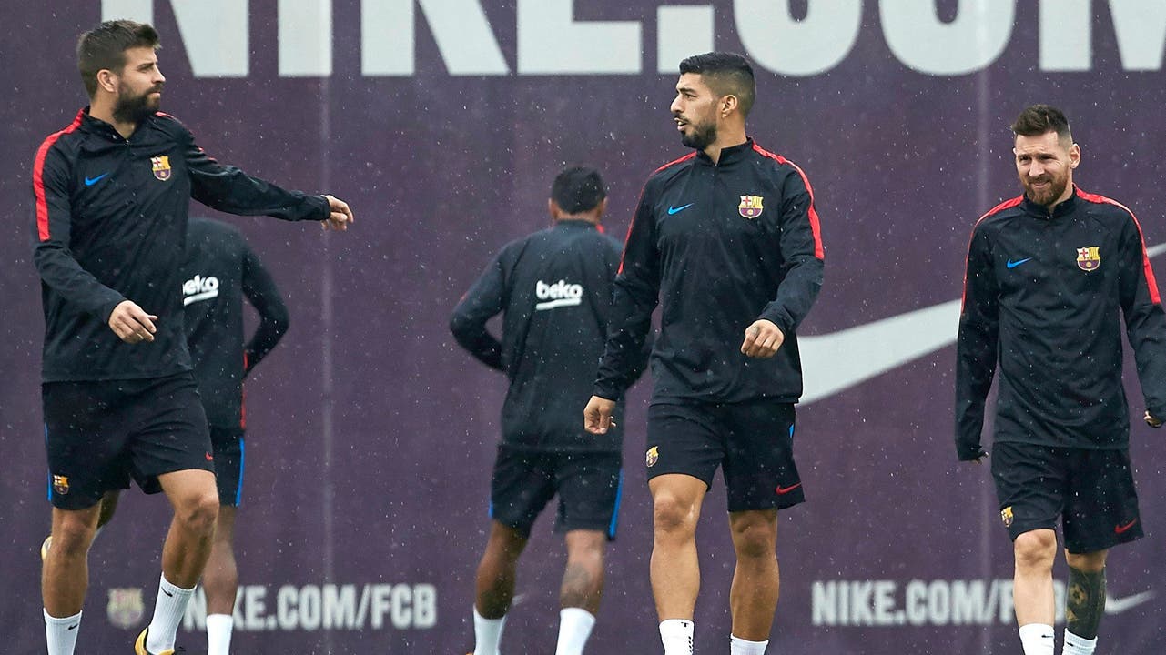 Gerard Piqué, Luis Suarez, Lionel Messi (von links): Das Training für die Barça-Spieler fällt am Dienstag aus.