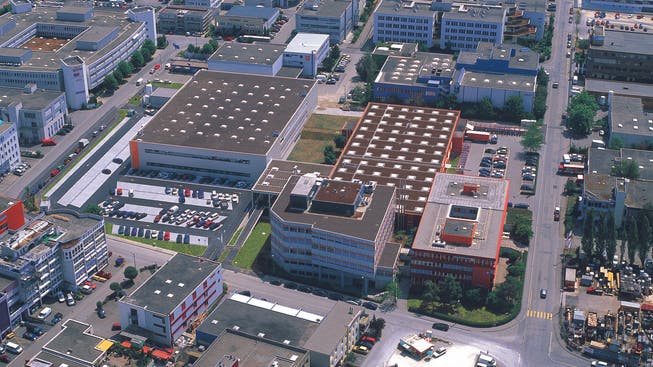 Das orange Gebäude Ecke Kägenstrasse/Christoph-Merian-Ring (unten rechts) wird ersetzt, ein zweites Gebäude wird auf dem dahinter liegenden Parkplatz errichtet.