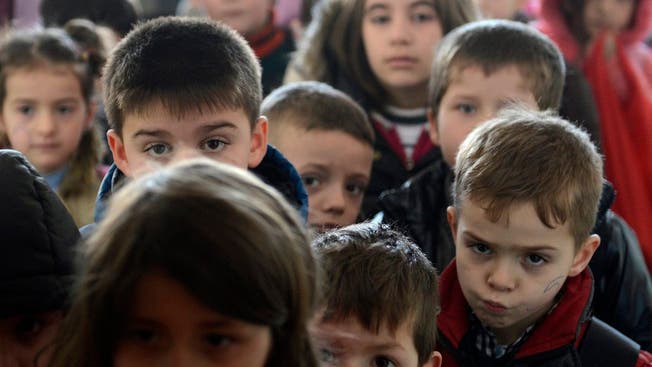 Kinder aus dem Kosovo, die flüchten mussten.