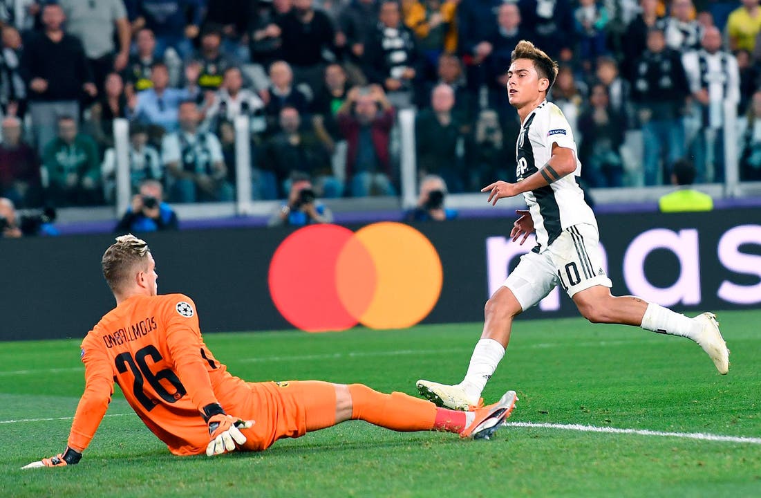 Italy Soccer Champions League Juventus' Paulo Dybala scores his side's 2nd goal during the Champions League, group H soccer match between Juventus and Young Boys, at the Allianz stadium in Turin, Italy, Tuesday, Oct. 2, 2018. (Alessandro Di Marco/ANSA via AP)