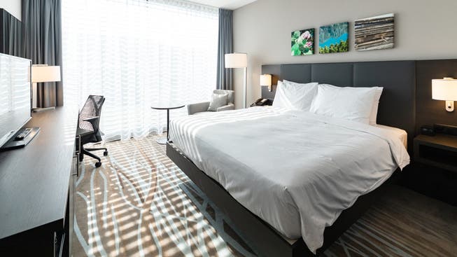 Ein Zimmer des im März eröffneten «Hilton Hotel Garden Inn Zurich Limmattal». Es könnte regionalen Hotels neuen Schwung verschaffen.