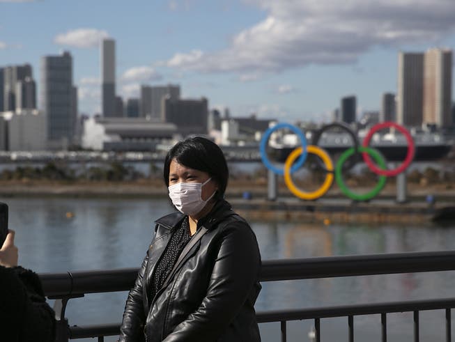 Schutzmaske und olympische Ringe: Tokio bangt um die Olympischen Spiele