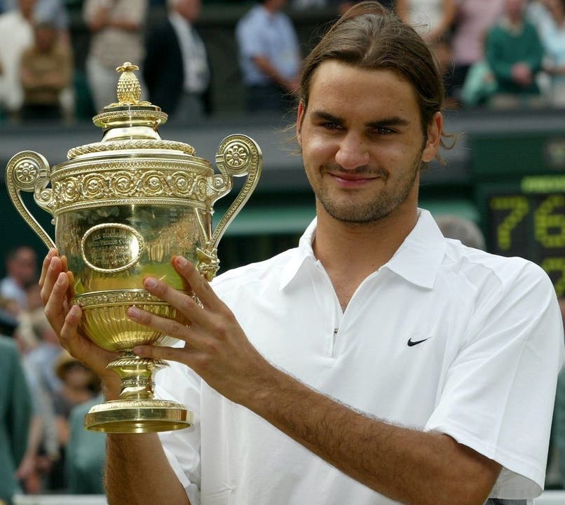 Das sind die 19 Grand Slam Titel von Roger Federer: 1) Der Anfang einer Ära. Roger Federer gewinnt in Wimbledon 2003 den Final gegen Mark Philippousis mit 7:6 (7:5), 6:2, 7:6 (7:3).