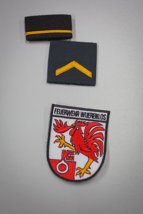 Gradabzeichen und das Wappen der Feuerwehr