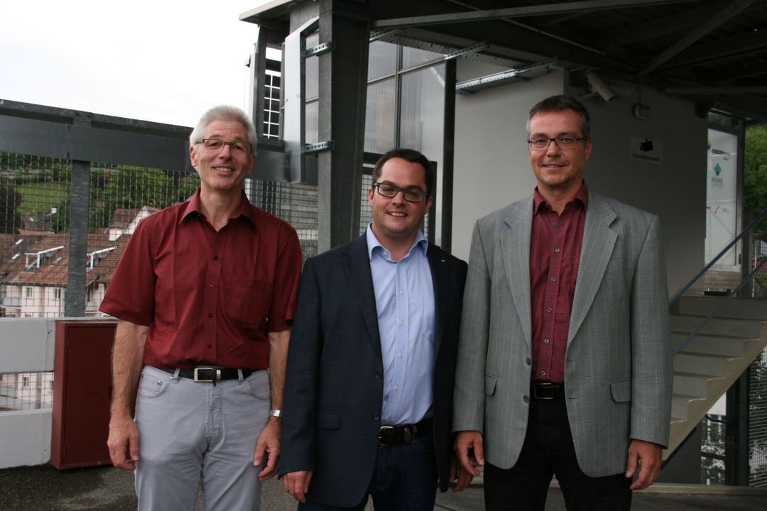 Renato Good, Parkhaus-Verantwortlicher der Stadt, Stadtrat Roger Huber und Christoph Umbricht, CEO Regionalwerke AG Baden, freuen sich über die gelungene Sanierung