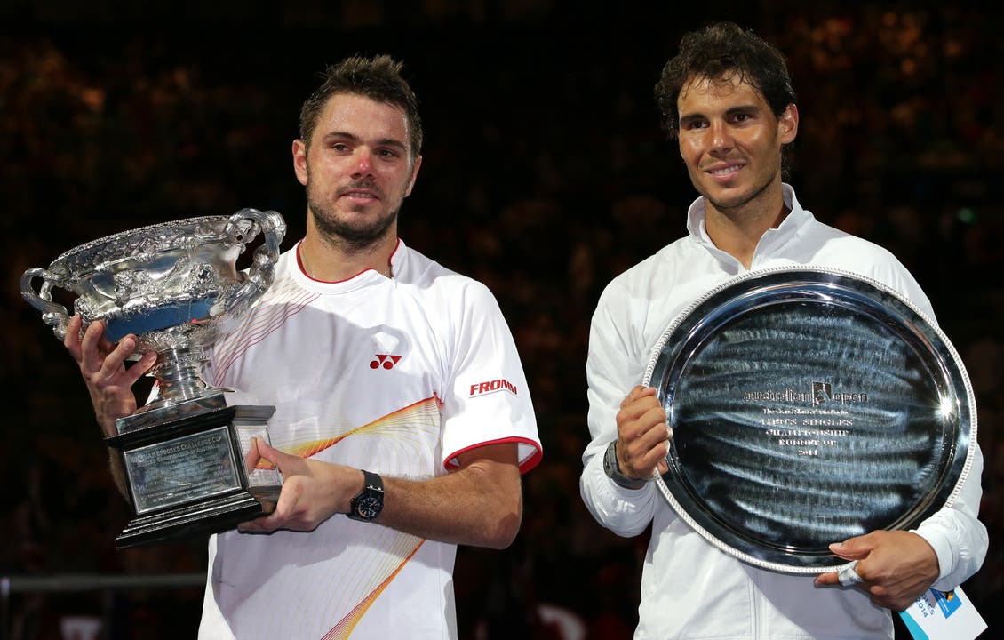 Stan Wawrinka als Sieger neben Verlierer Rafael Nadal