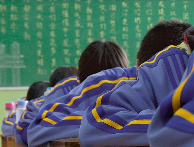 Schreckbild chinesische Schule: Doch für Kritiker unseres Bildungssystems werden Kinder auch an unseren Schulen «dressiert».