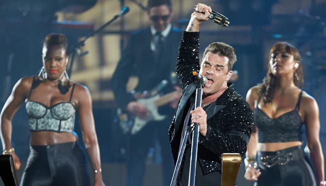 «Ich bin hergekommen, um diese Stadt zu unterhalten»: Robbie Williams gestern Abend im Zürcher Letzigrund. THOMAS REUFER