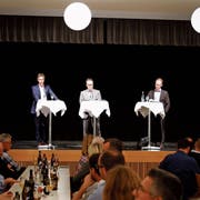 Felix Wüst (von links), Michael Fitzi und Werner Reifler zeigen sich vor dem zweiten Wahlgang nochmals von ihrer besten Seite. Bild: Jolanda Riedener