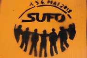 Weiter für eine andere Welt: das Logo des Sozial- und Umweltforums Ostschweiz. (Bild: Reto Voneschen - 5. Mai 2018)