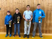 Die Festsieger des Wiler Buebeschwinget, von links: Travis Keiser (Wilen bei Wil), Luca Streuli (Untereggen), Simon Fäh (Benken SG) und Tobias Schönenberger (Kirchberg SG). (Bild: Pascal Schönenberger)