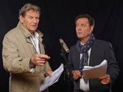 Zwei unverkennbare Stimmen, die Säle füllen: Michael Schacht, Sprecher von Philip Maloney, und Heinz Margot.