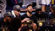 Spieler des Meisters der Golden State Warriors: Andre Iguodala, Klay Thompson, Stephen Curry, und Draymond Green. (David Maxwell/EPA)
