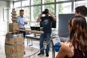 Die NTB hat eine alte Weinpresse über Virtual Reality nachgebildet. Die Besucher können mit einer VR-Brille den Torkel bedienen. (Bild: PD)