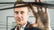 Dominik Kaiser in seinem Büro in Schlieren. Foto: Chris Iseli (Bild: Schweiz am Wochenende)