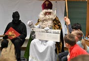 Der Samiglais mit seinem grossen Buch.