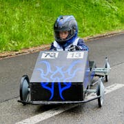 Trotz nasser Piste steuerten die Piloten ihre Seifenkisten schnell ins Ziel. (Bilder: Isabelle Merk)