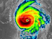 Eine Infrarot-Satellitenaufnahme vom Auge des Wirbelsturms «Michael». (Bild: KEYSTONE/AP NOAA)