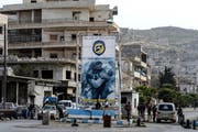Ein Checkpoint von Kämpfern der Syrischen Opposition in der Stadt Idlib. (Bild: Ugur Can/DHA via AP)