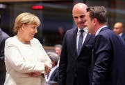 Die deutsche Kanzlerin Angela Merkel, Alain Berset und der Premierminister von Luxemburg Xavier Bettel am Asem-Gipfel. (Bild: EPA/OLIVIER HOSLET)